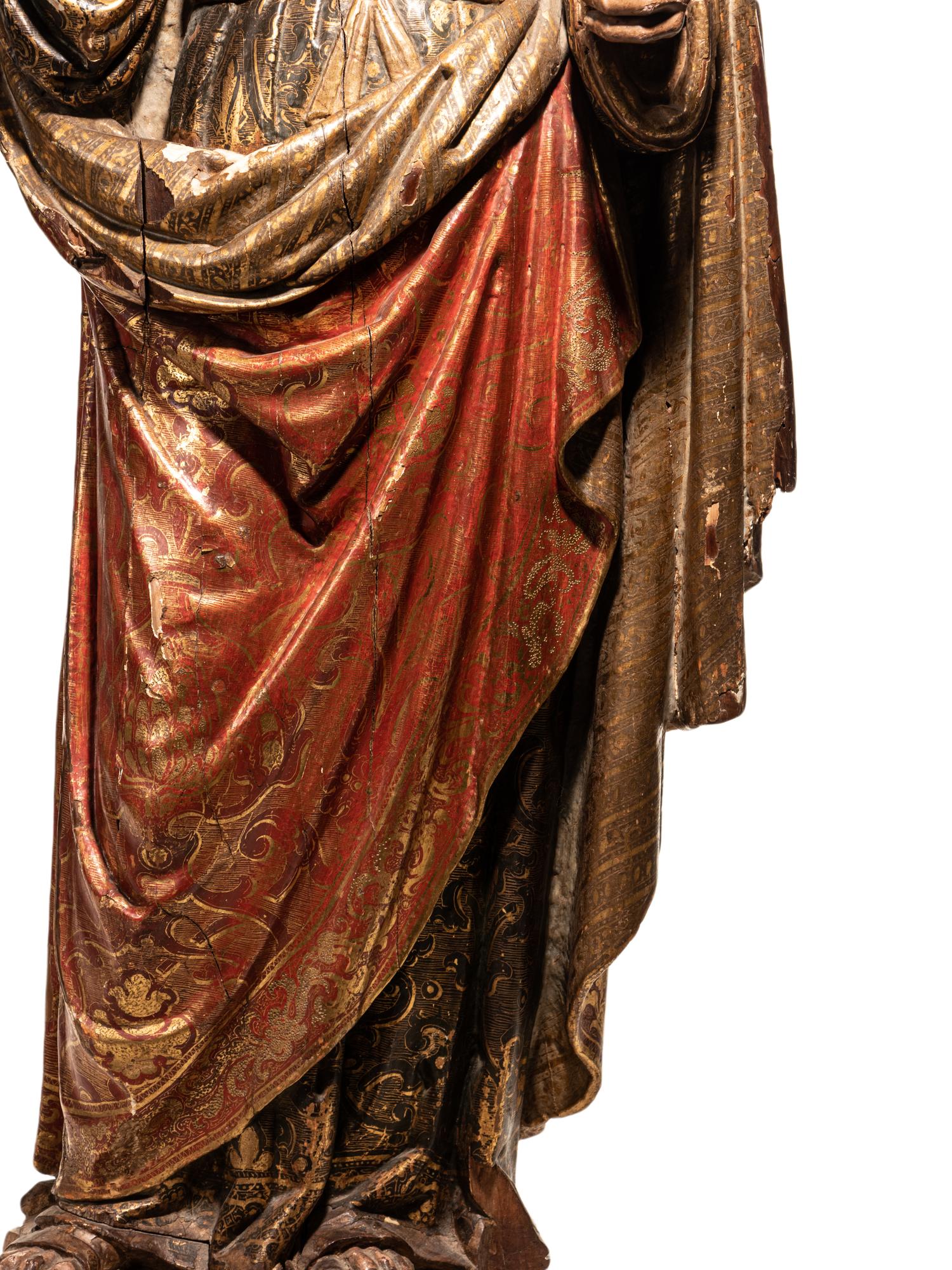A Carved Parcel Gilt and Polychrome Decorated Figure of Santa Luzia