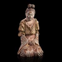 A Japanese painted pottery figure of a female attendant