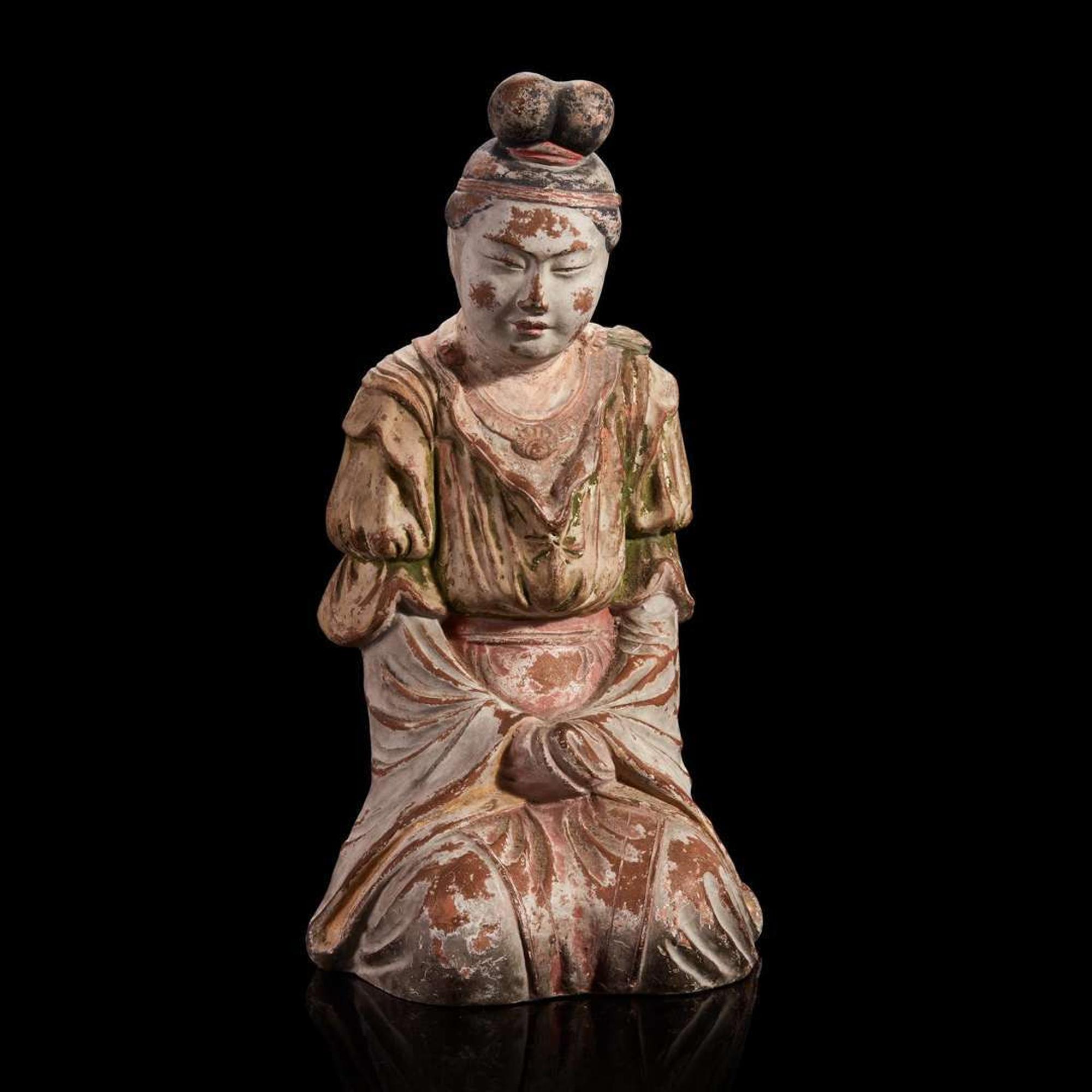 A Japanese painted pottery figure of a female attendant