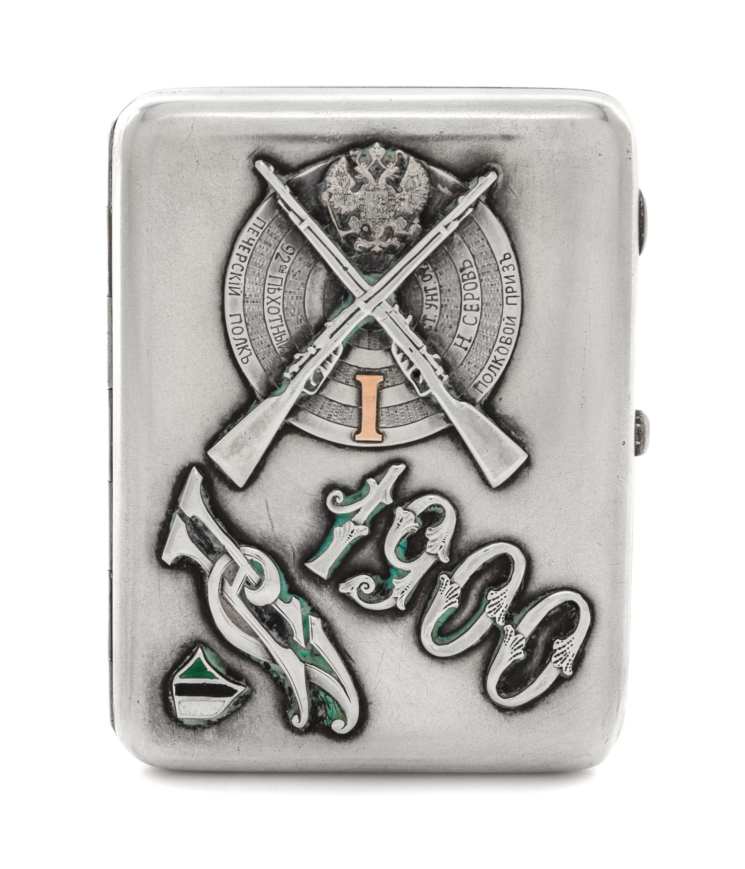 A Russian Silver and Enamel Cigarette Case, Maker's Mark MK, Moscow, Late 19th Century, the case with an applied military insignia, the