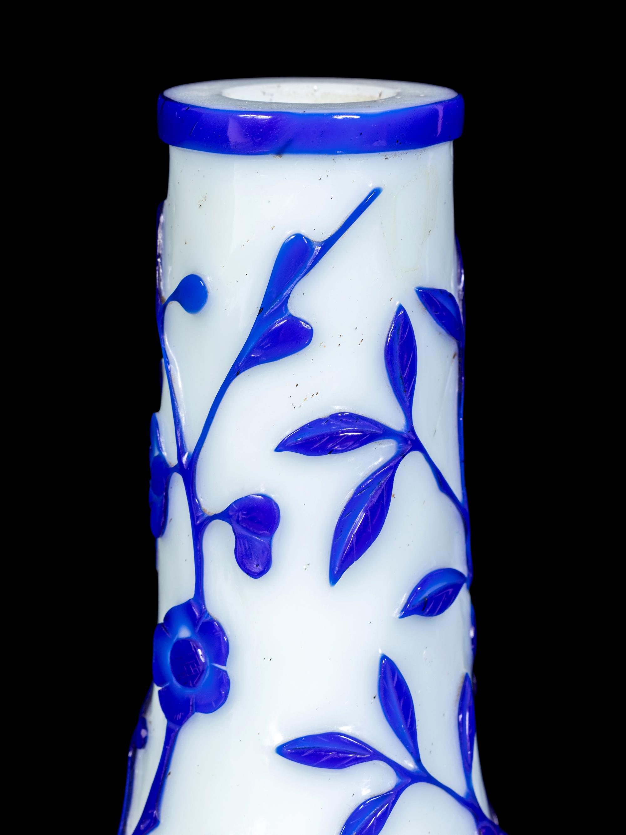 A Pair of Chinese Blue Overlay Opaque White Glass Bottle Vases