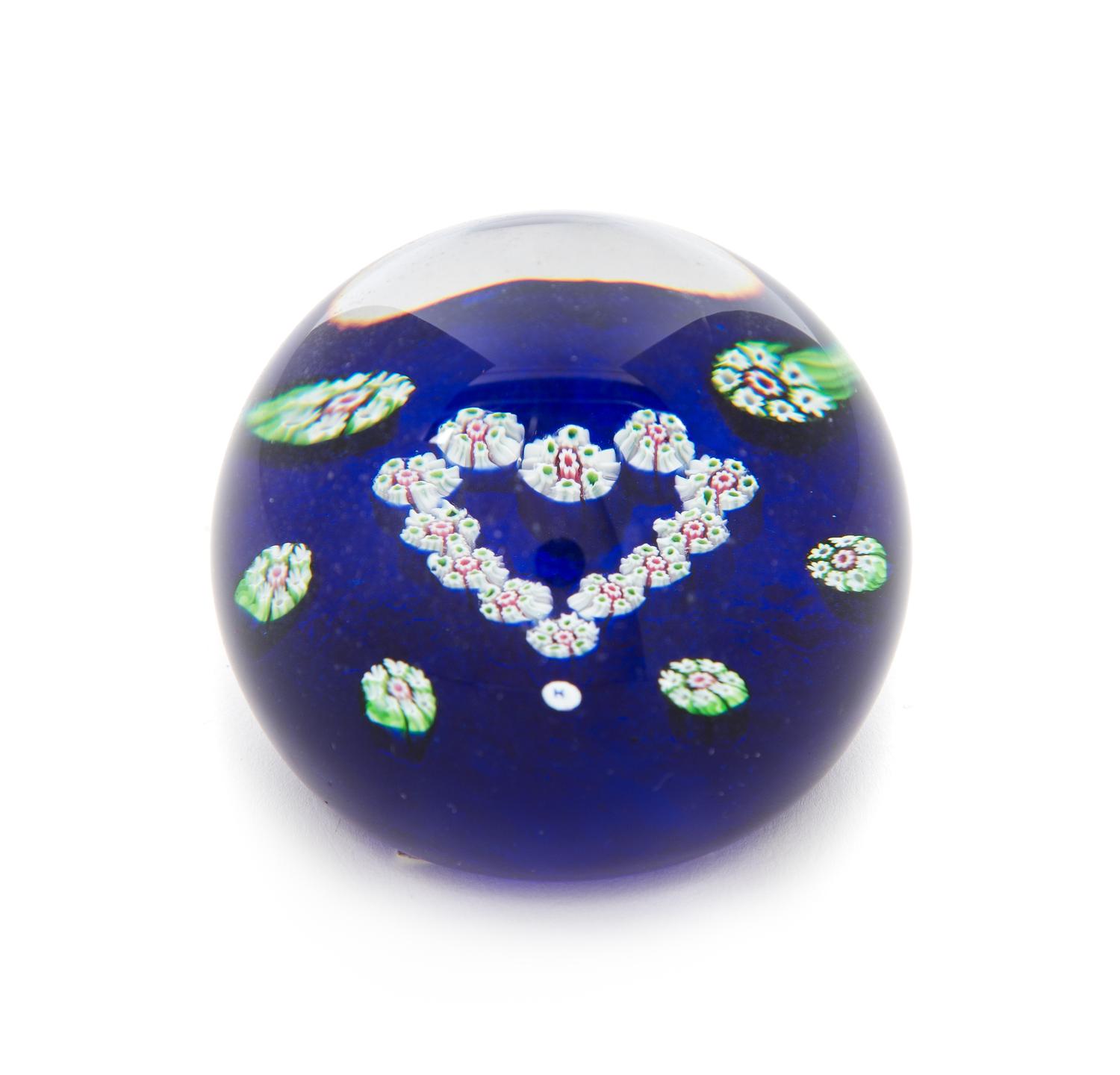 Paul Ysart, (Spanish, 1904-1991), a translucent blue-ground millefiori heart paperweight