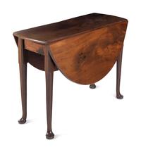 A George III Mahogany Drop-Leaf Gate-Leg Table