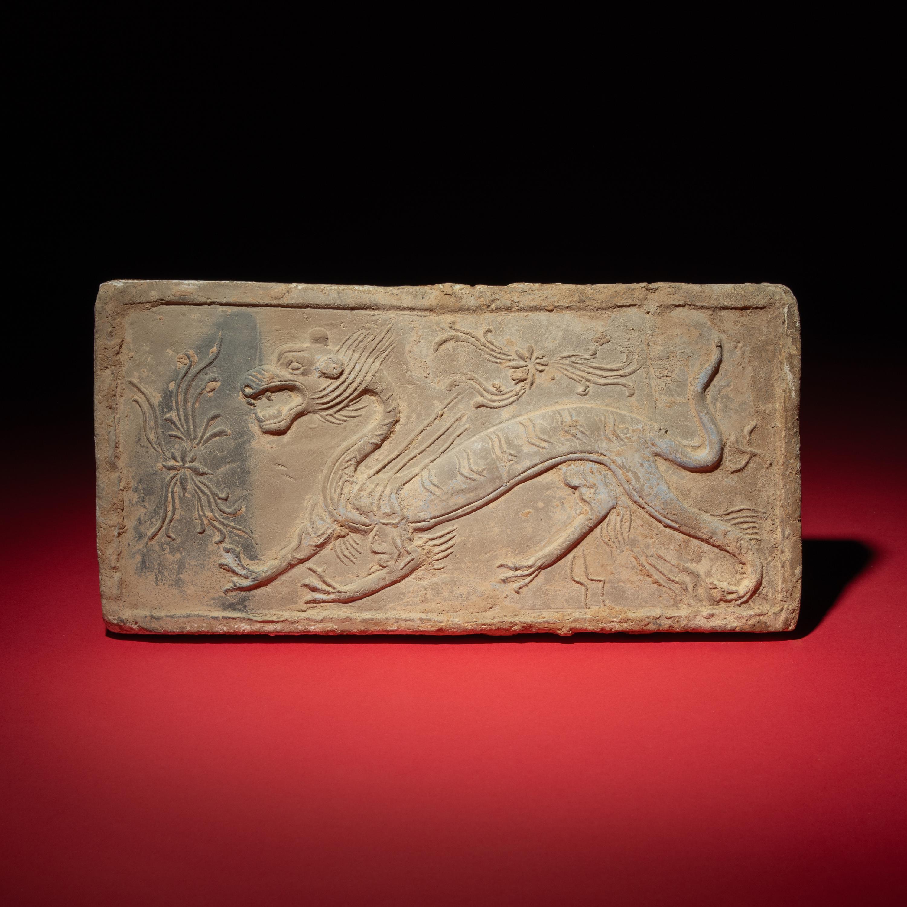 A Chinese Grey Pottery 'White Tiger' Relief Tomb Brick, Southern Dynasties — 南朝 灰陶四神白虎畫像磚