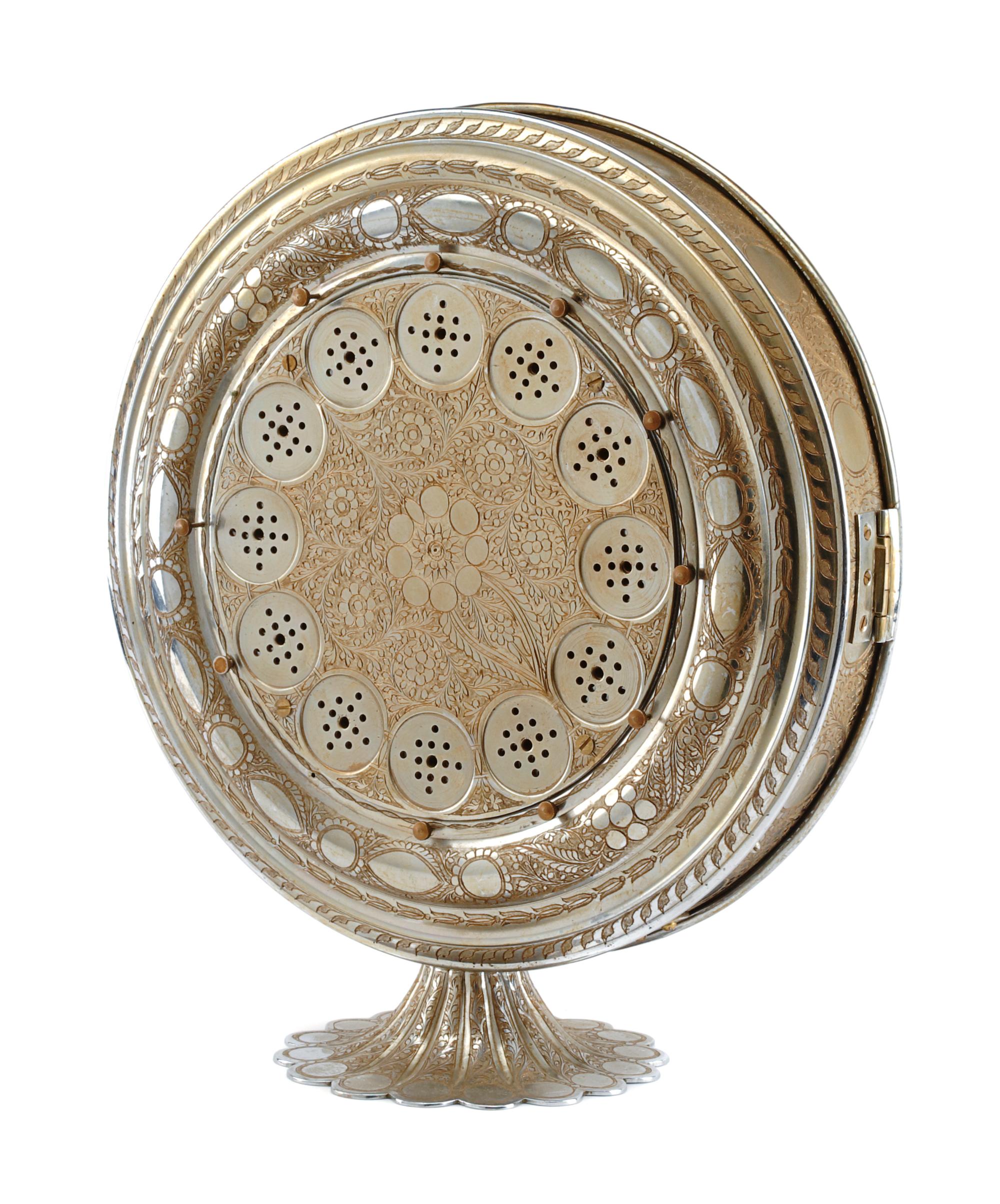 A Fred Zimbalist Twelve-Air Music Box Height 15 3/4; diameter of case 14 1/8 inches.