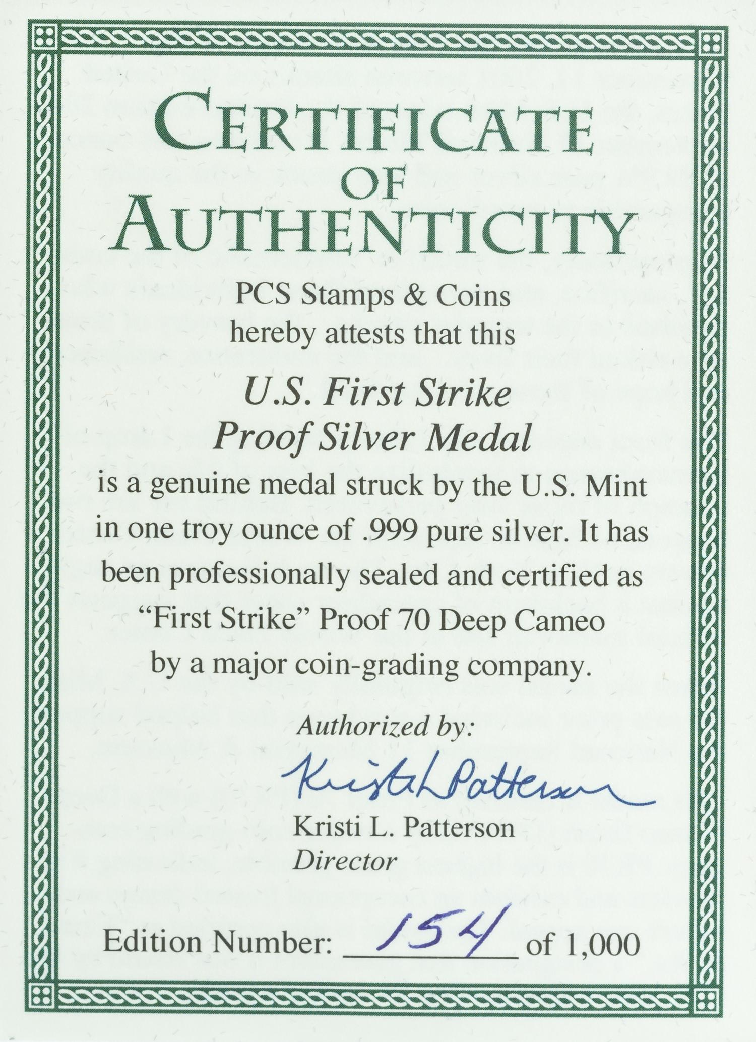 A Pair of United States 2011-W September 11, 2001 Memorial Limited Edition First Strike 1 Oz. Silver Medals