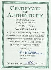 A Pair of United States 2011-W September 11, 2001 Memorial Limited Edition First Strike 1 Oz. Silver Medals