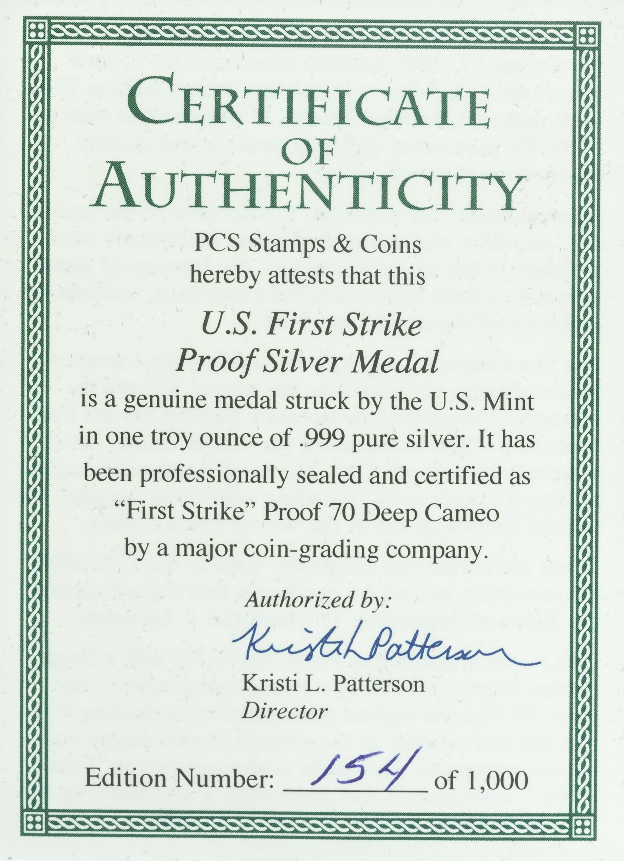 A Pair of United States 2011-W September 11, 2001 Memorial Limited Edition First Strike 1 Oz. Silver Medals