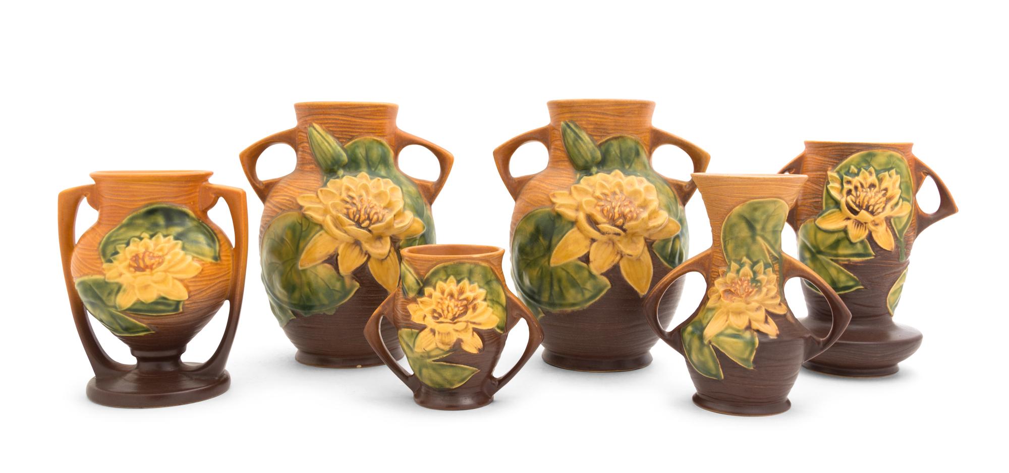 Six Roseville Waterlilly Pottery Vases Heght of tallest 8 1/4 inches.