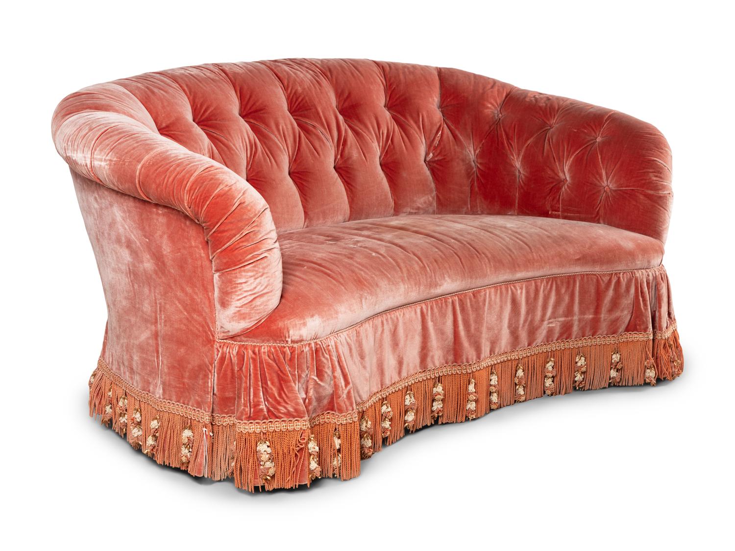 A Button-Tufted Velvet Reniform Sofa