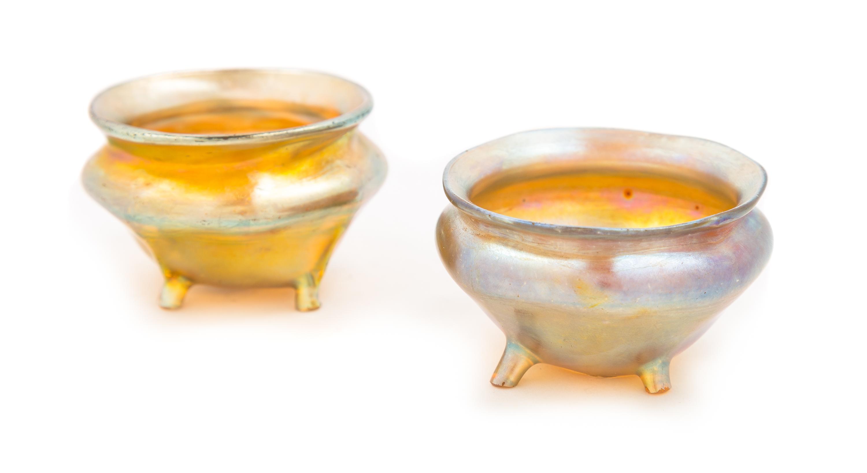 Tiffany Studios, EARLY 20TH CENTURY, two Favrile glass footed salts, with gold iridescence
