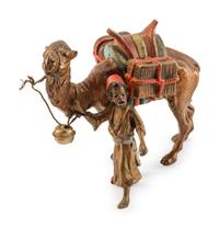An Austrian Cold-Painted Bronze of a Boy With a Camel — CIRCA 1900