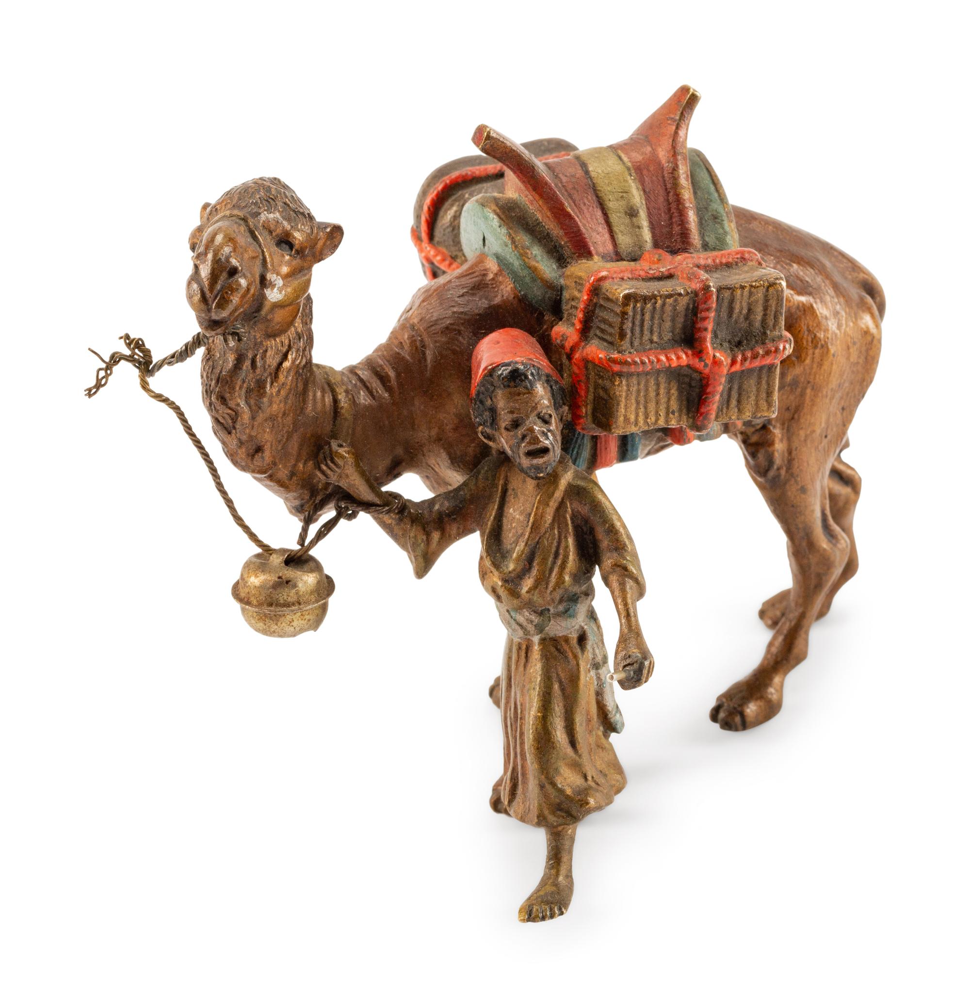 An Austrian Cold-Painted Bronze of a Boy With a Camel — CIRCA 1900