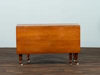 A Late Federal Cherrywood Drop-Leaf Dining Table (Please send consignor donation receipt once donated)