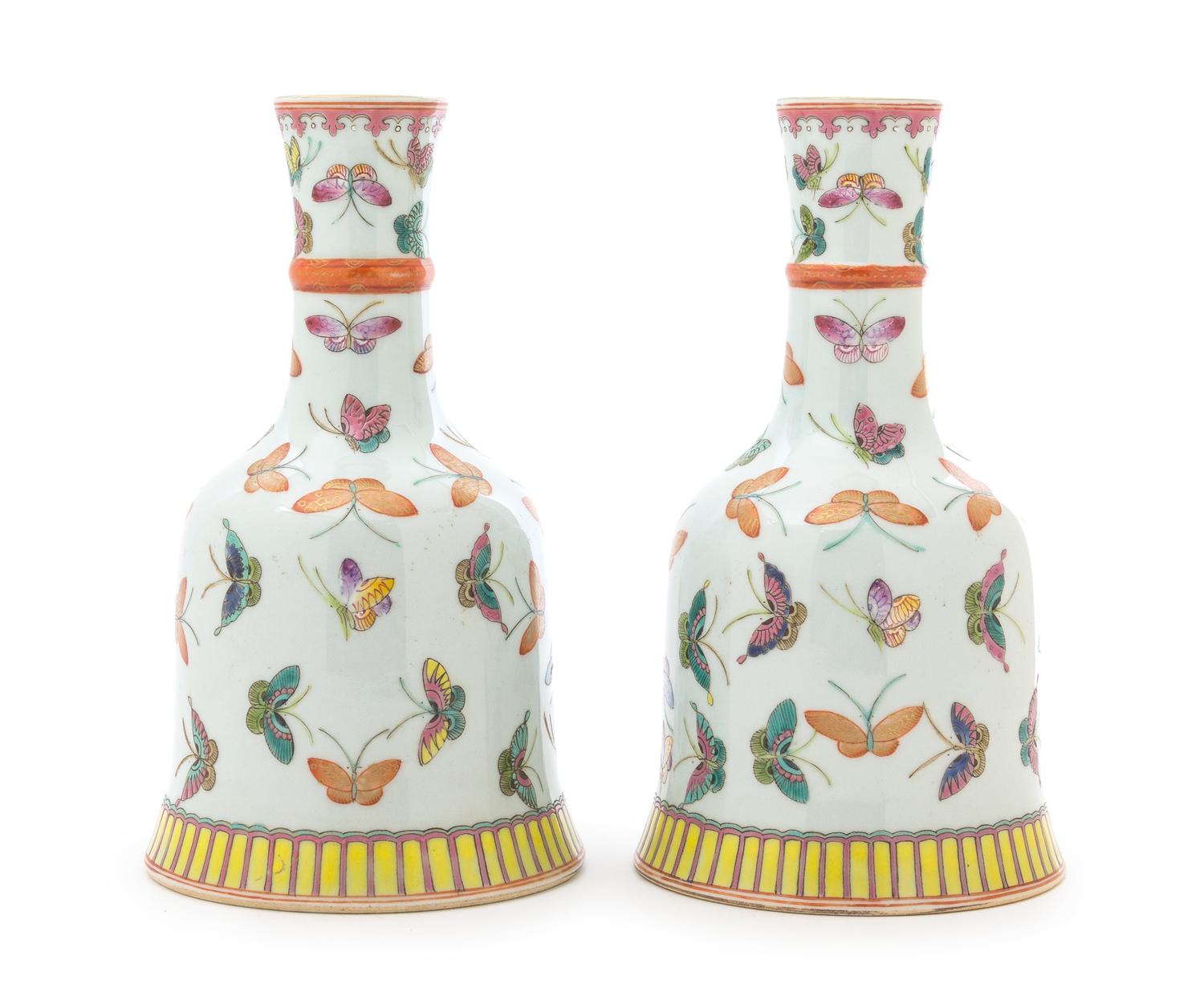 A Pair of Famille Rose Porcelain Vases Height 8 1/4 inches.