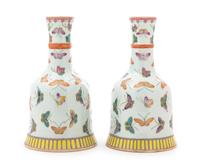 A Pair of Famille Rose Porcelain Vases Height 8 1/4 inches.