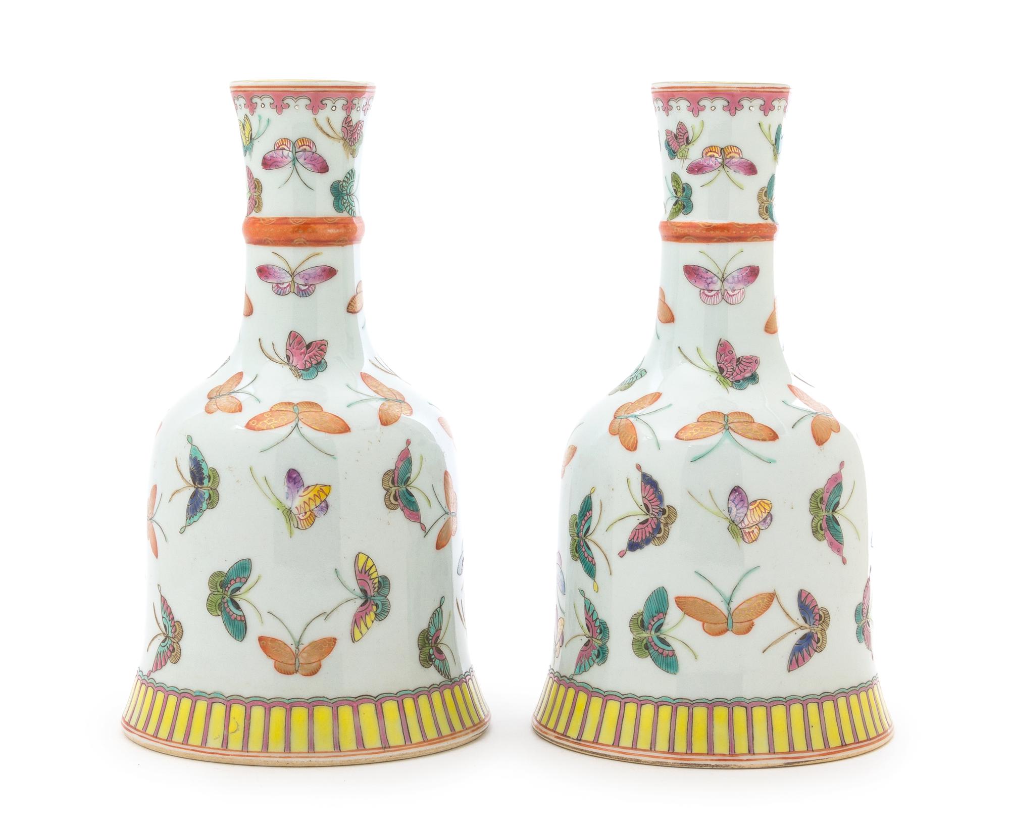 A Pair of Famille Rose Porcelain Vases Height 8 1/4 inches.