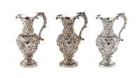 Three Jewel-Inset Silver Ewers, Harry Smith, Perrysville, IN, each having a serpentine handle.