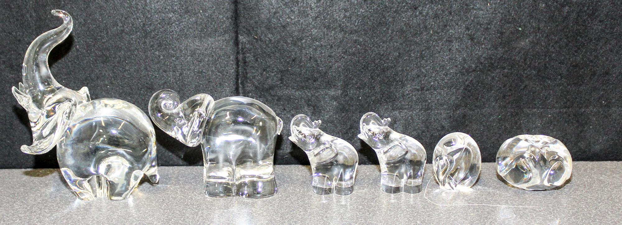 A Collection of Five Steuben Glass Elephant Figures Height of tallest 7 1/2 inches.
