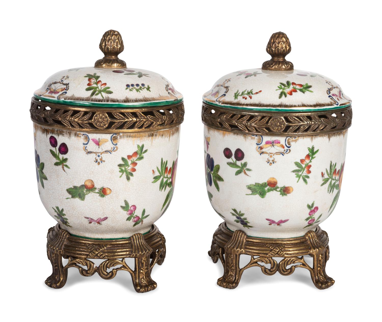 A Pair of United Wilson Gilt Metal Mounted Porcelain Urns