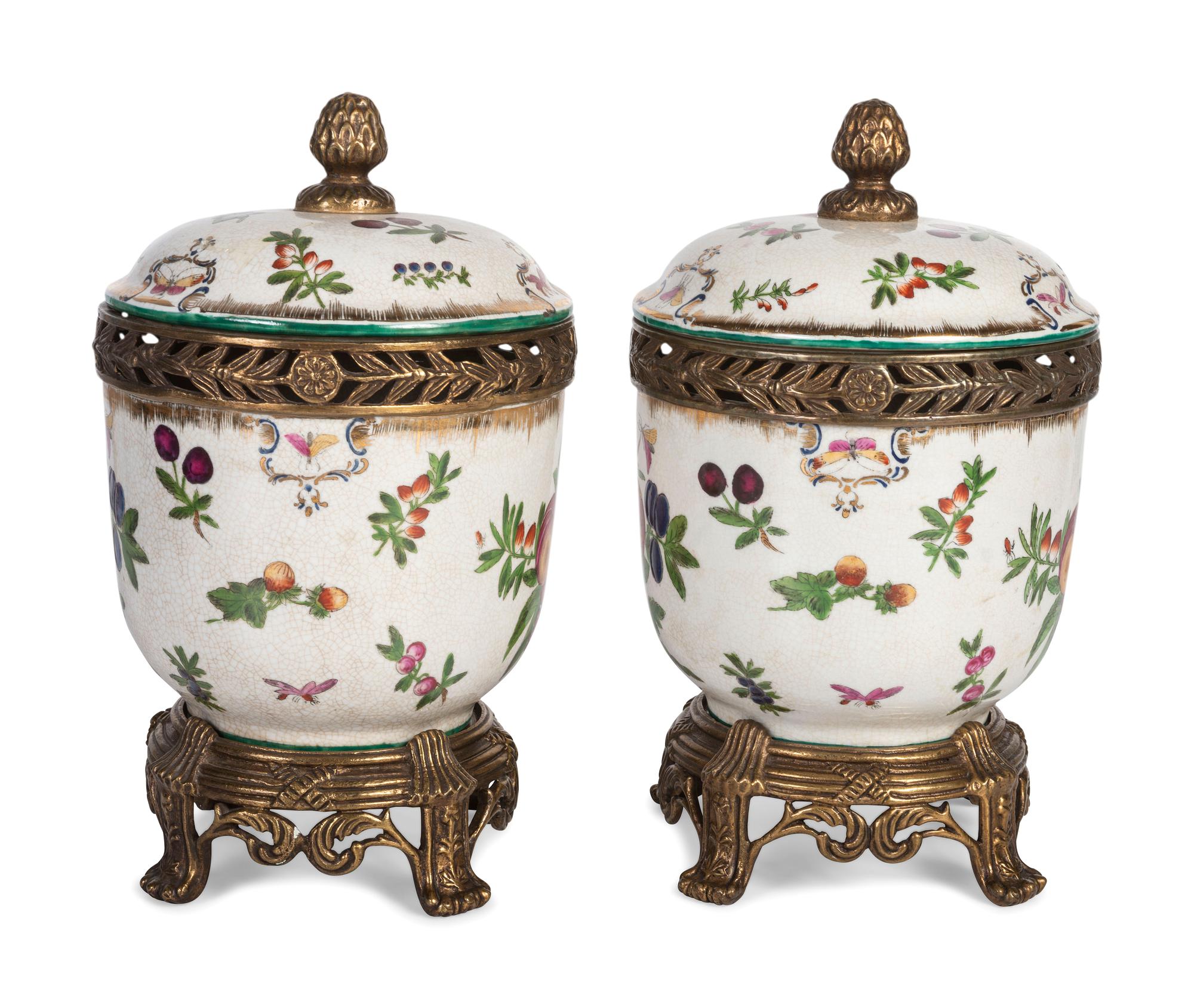 A Pair of United Wilson Gilt Metal Mounted Porcelain Urns