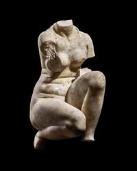 A Roman Marble Crouching Venus