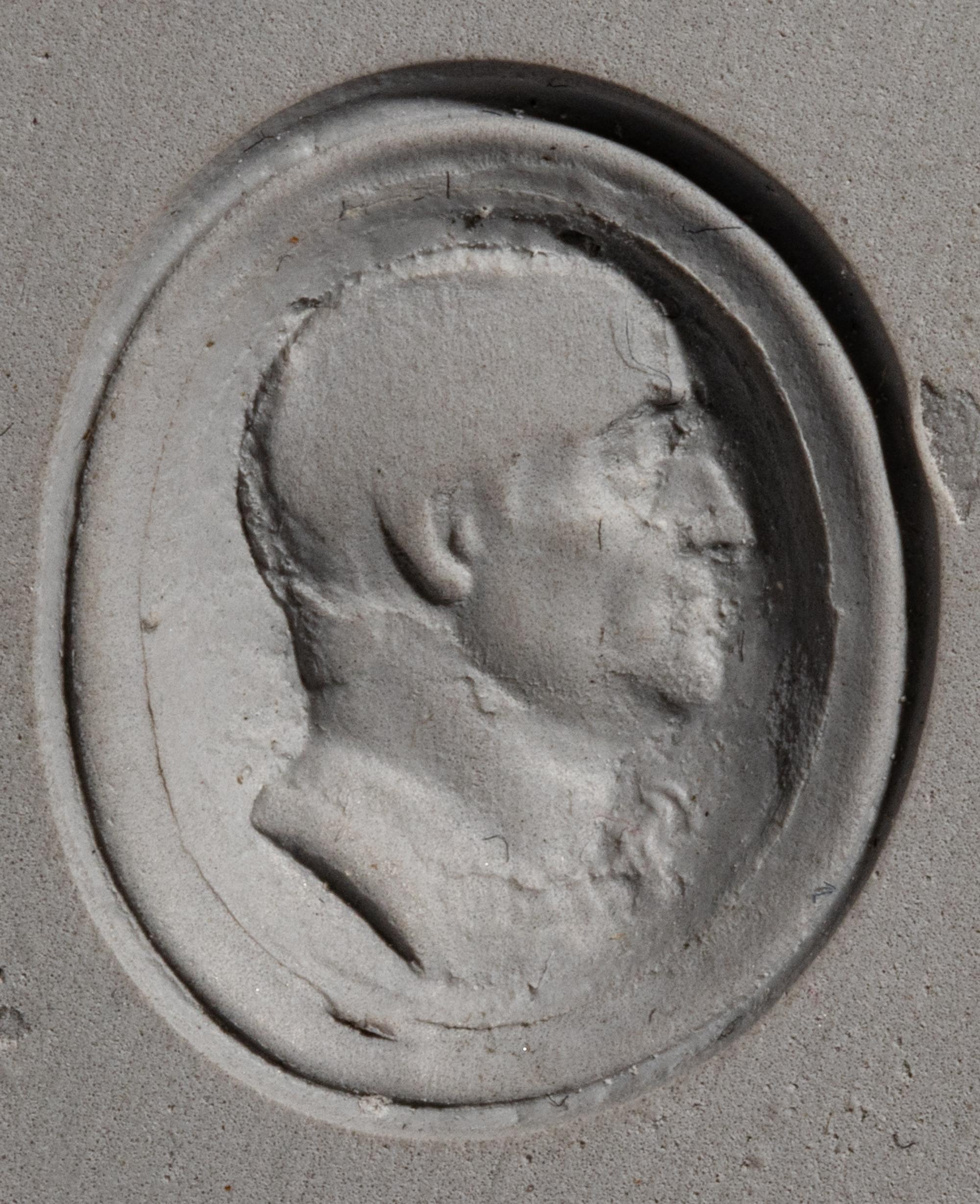 A Roman Glass Ring Stone with a Male Portrait Head — Set in a gold ring