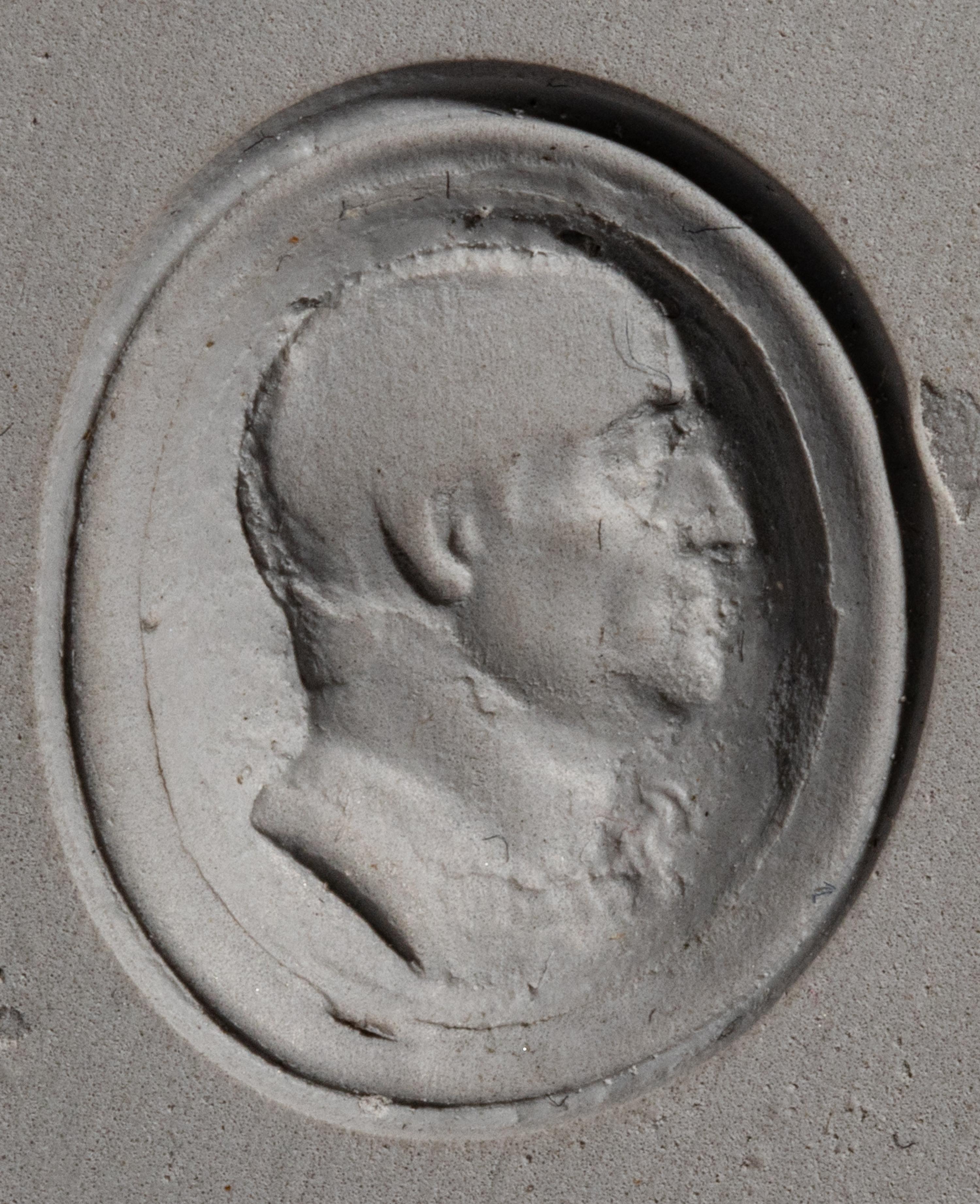 A Roman Glass Ring Stone with a Male Portrait Head — Set in a gold ring