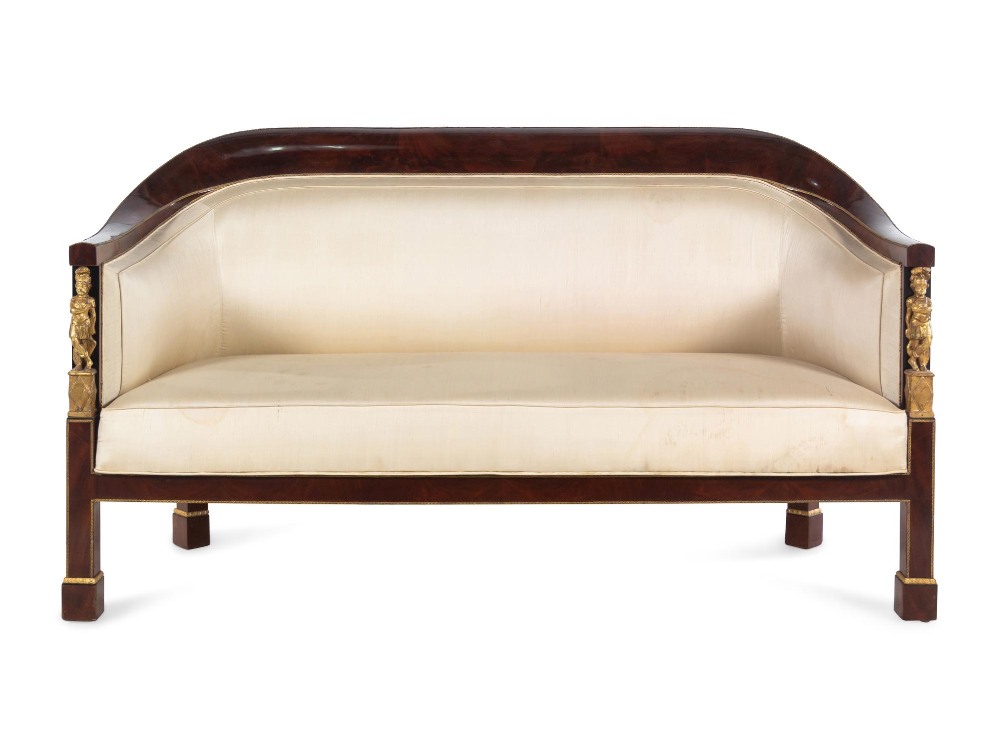 An Austrian Parcel Gilt Mahogany Sofa