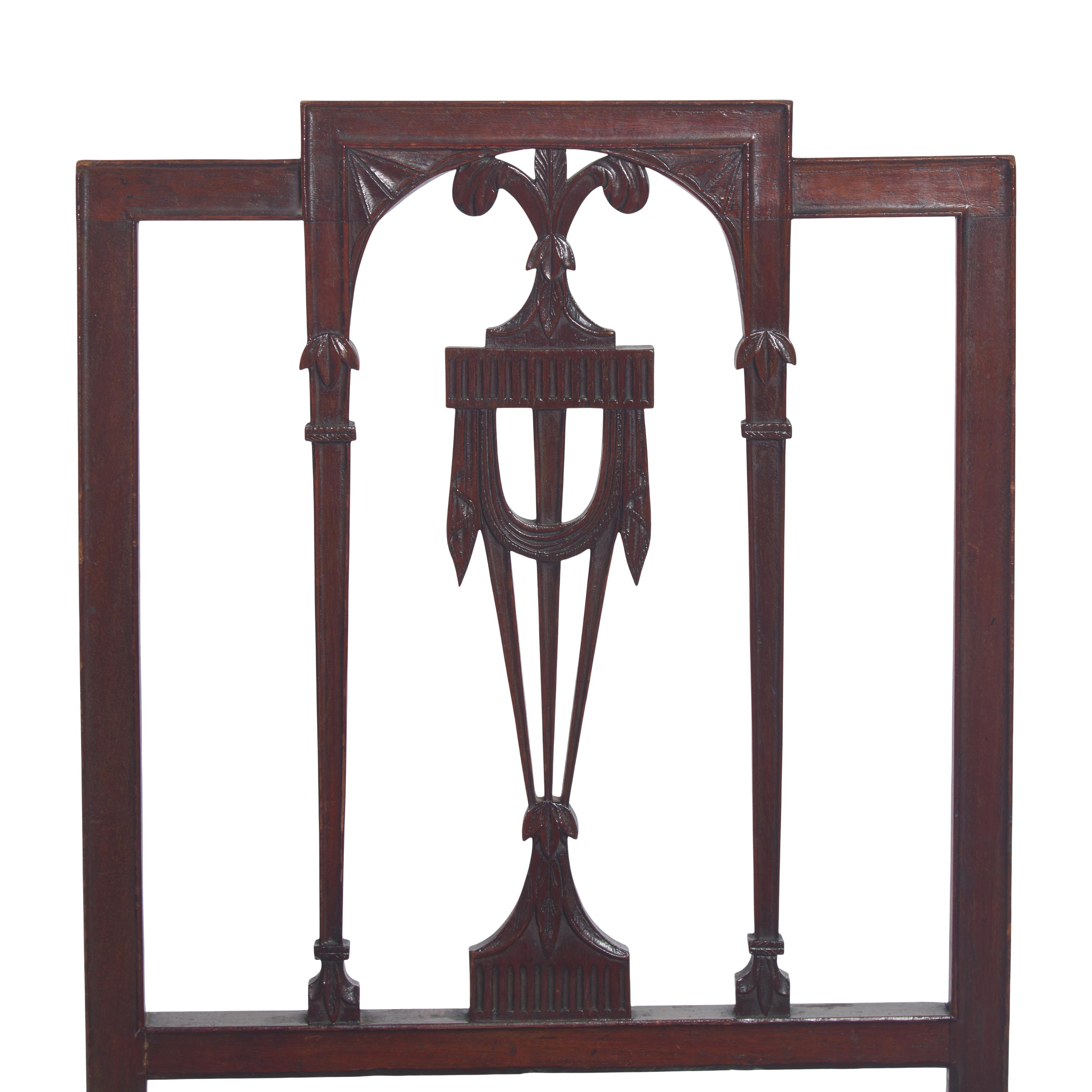 An Assembled Group of Six Federal Carved Mahogany Urn-Back and Serpentine Seat Dining Chairs