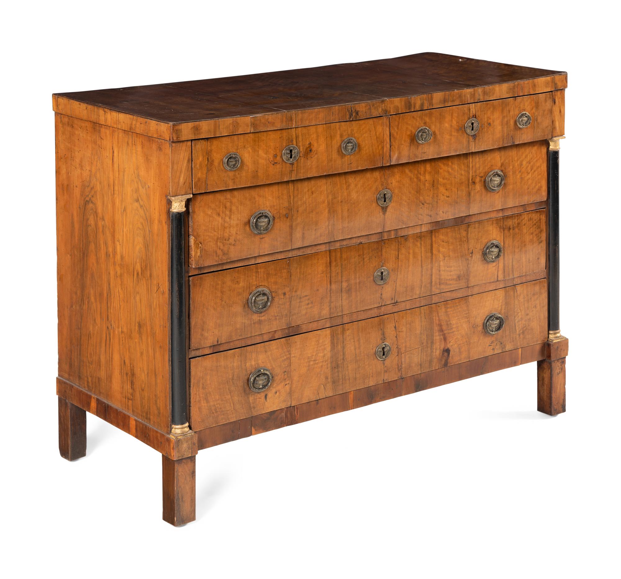 An Empire Walnut and Parcel Ebonized Commode