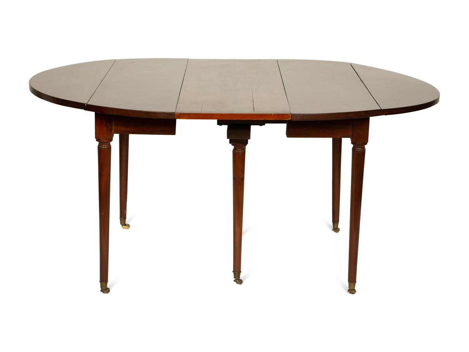 A Directoire Mahogany Drop-Leaf Dining Table