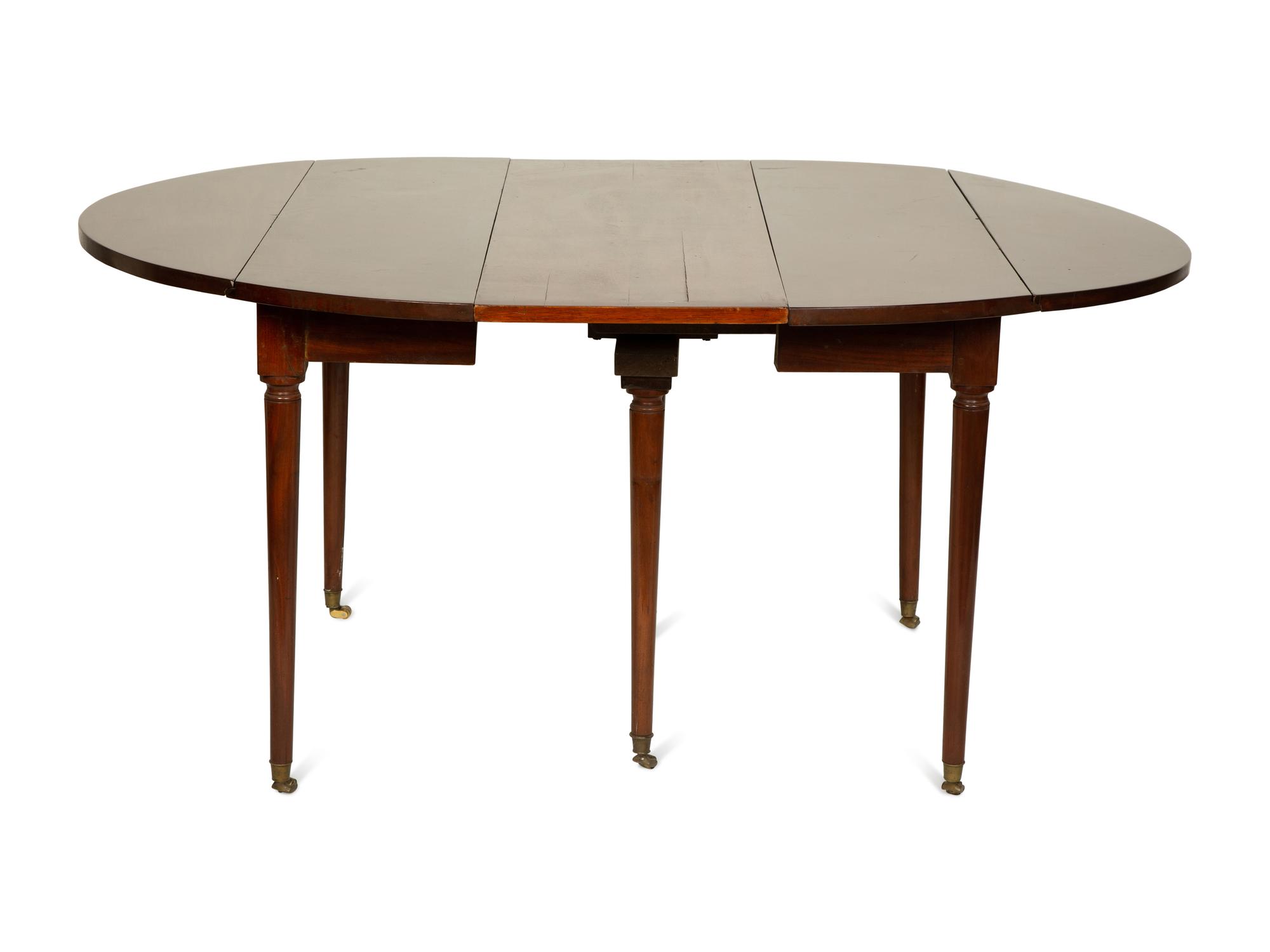 A Directoire Mahogany Drop-Leaf Dining Table