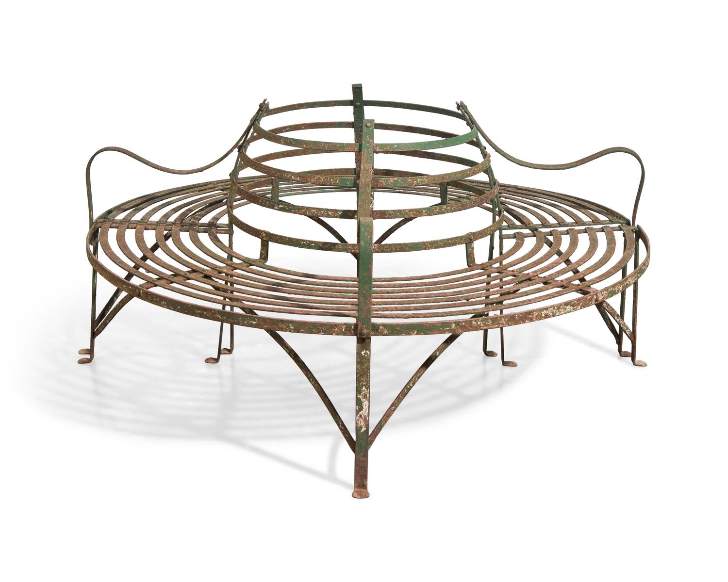 A Pair of Curved Wrought Iron Tree Benches