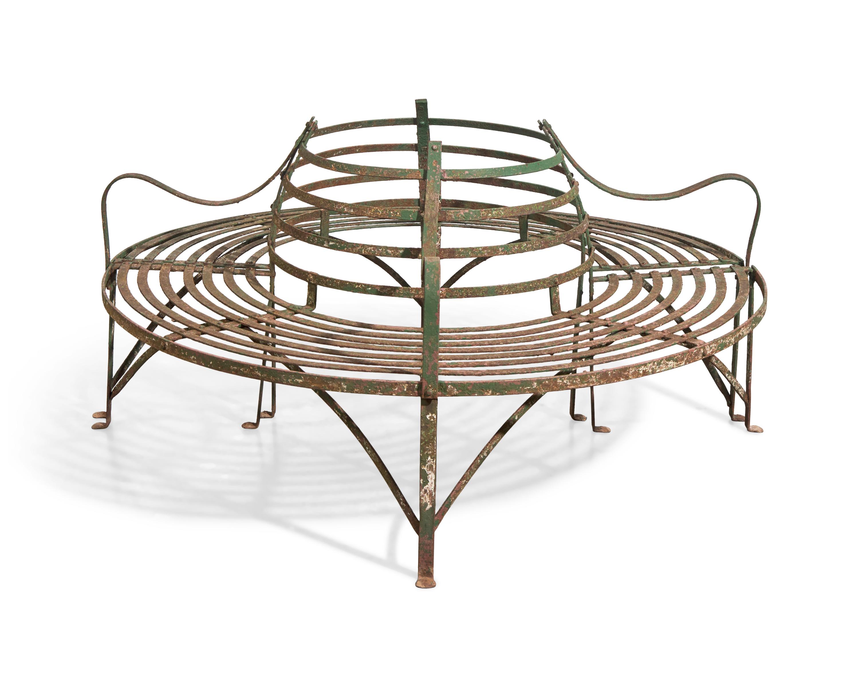 A Pair of Curved Wrought Iron Tree Benches