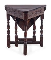 A Jacobean Carved Oak Gate-Leg Table