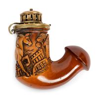 A Group of Nine Carved Meerschaum and Wooden Pipes