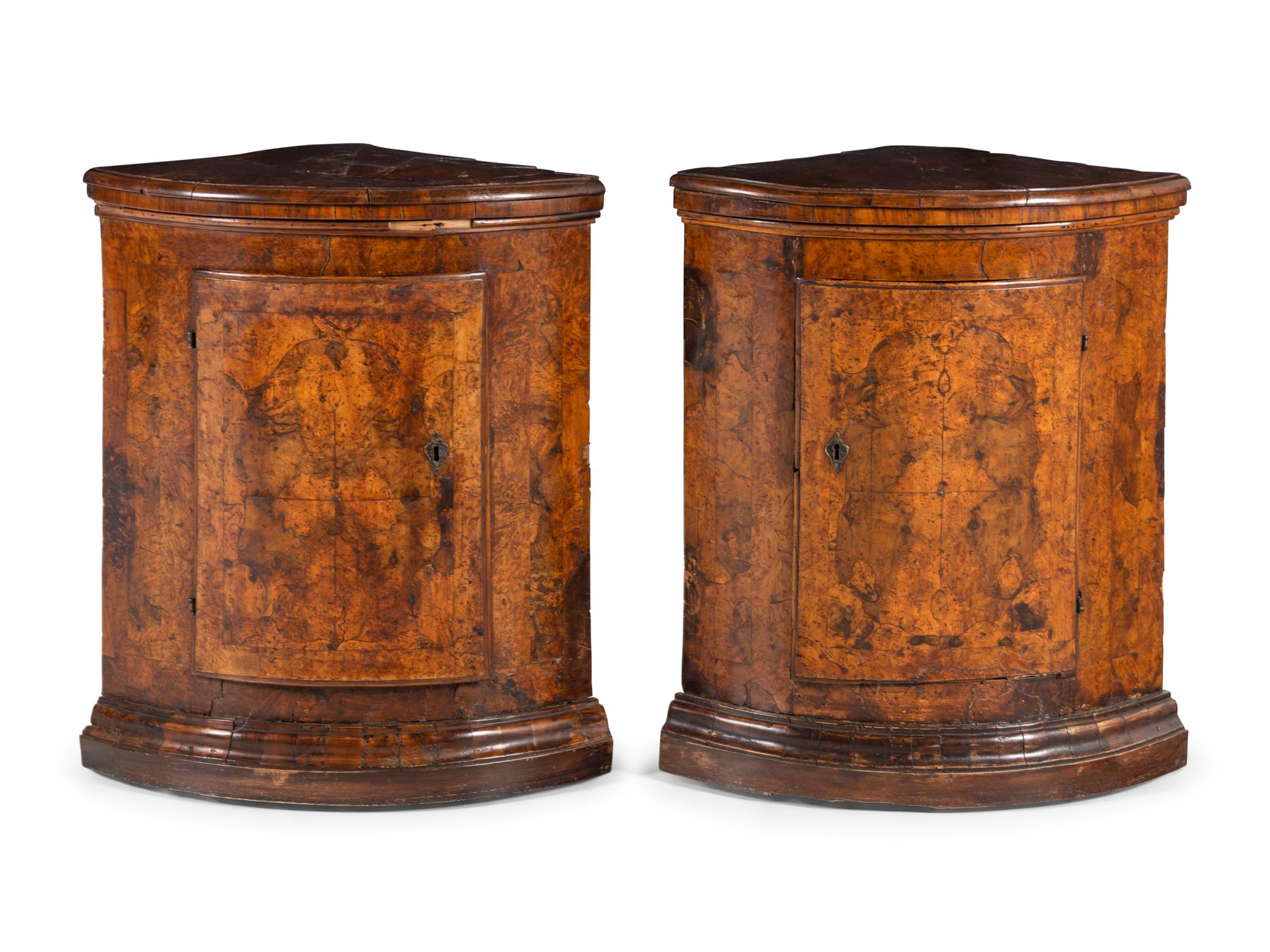 A Pair of North Italian Walnut Corner Cupboards