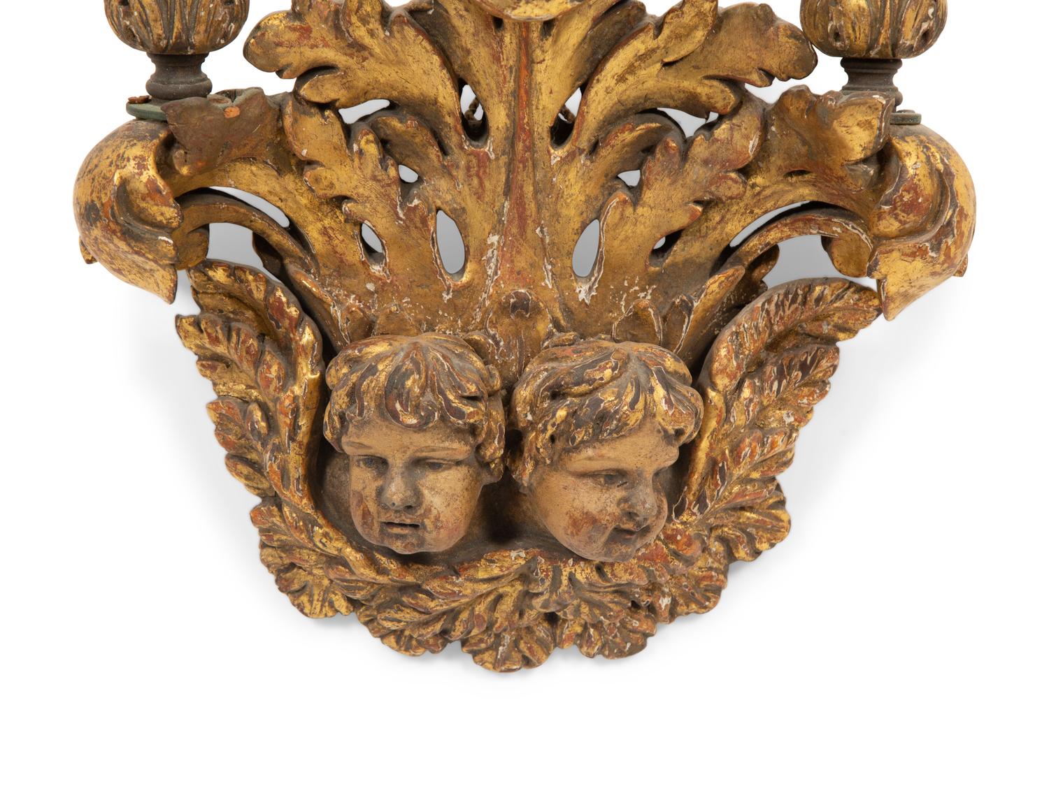 An Italian Baroque Style Giltwood Three Light Wall Sconce