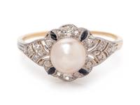 A Platinum Topped Yellow Gold, Pearl, Diamond and Onyx Ring,