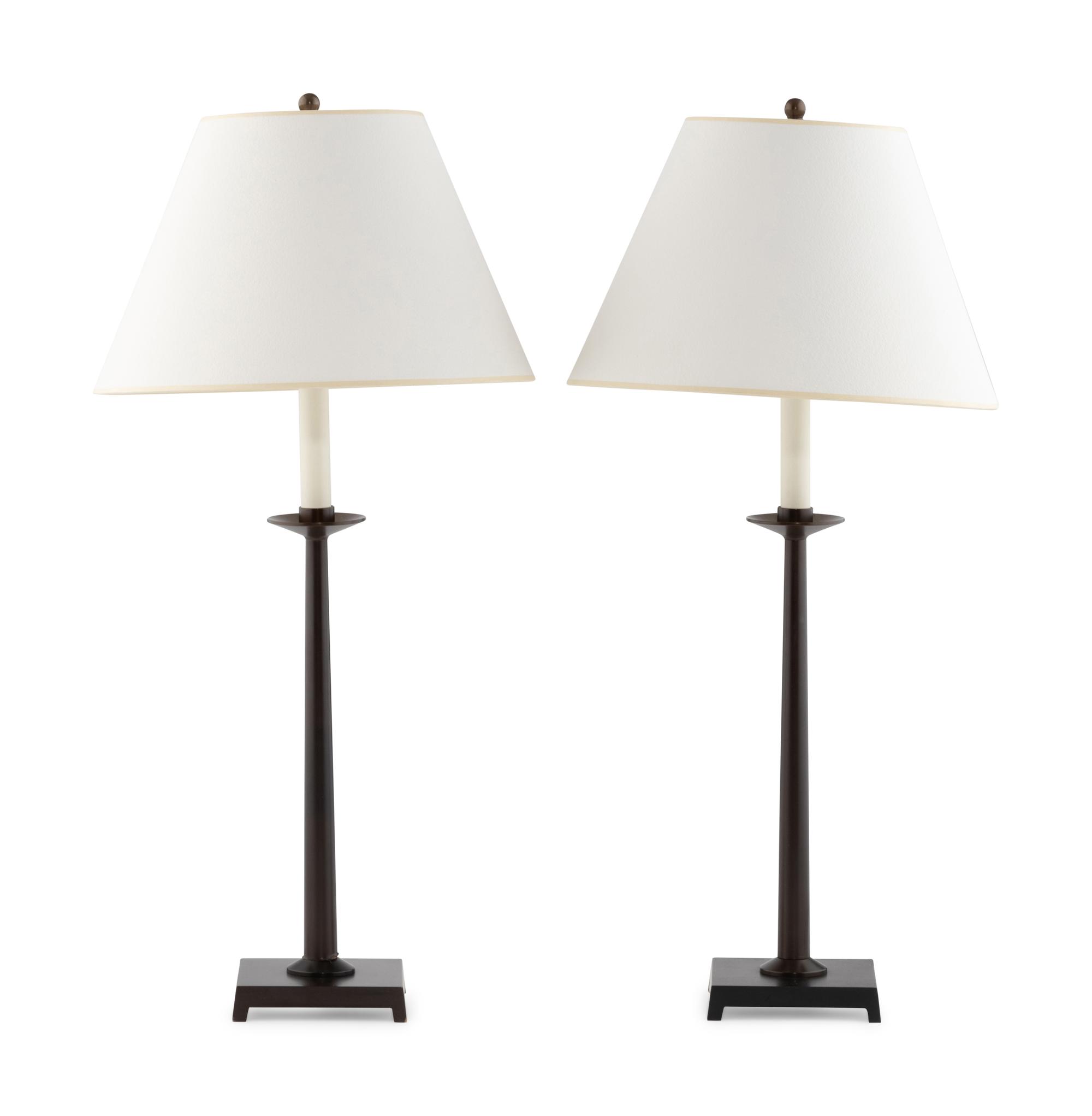 A Pair of Patinated Metal Lamps