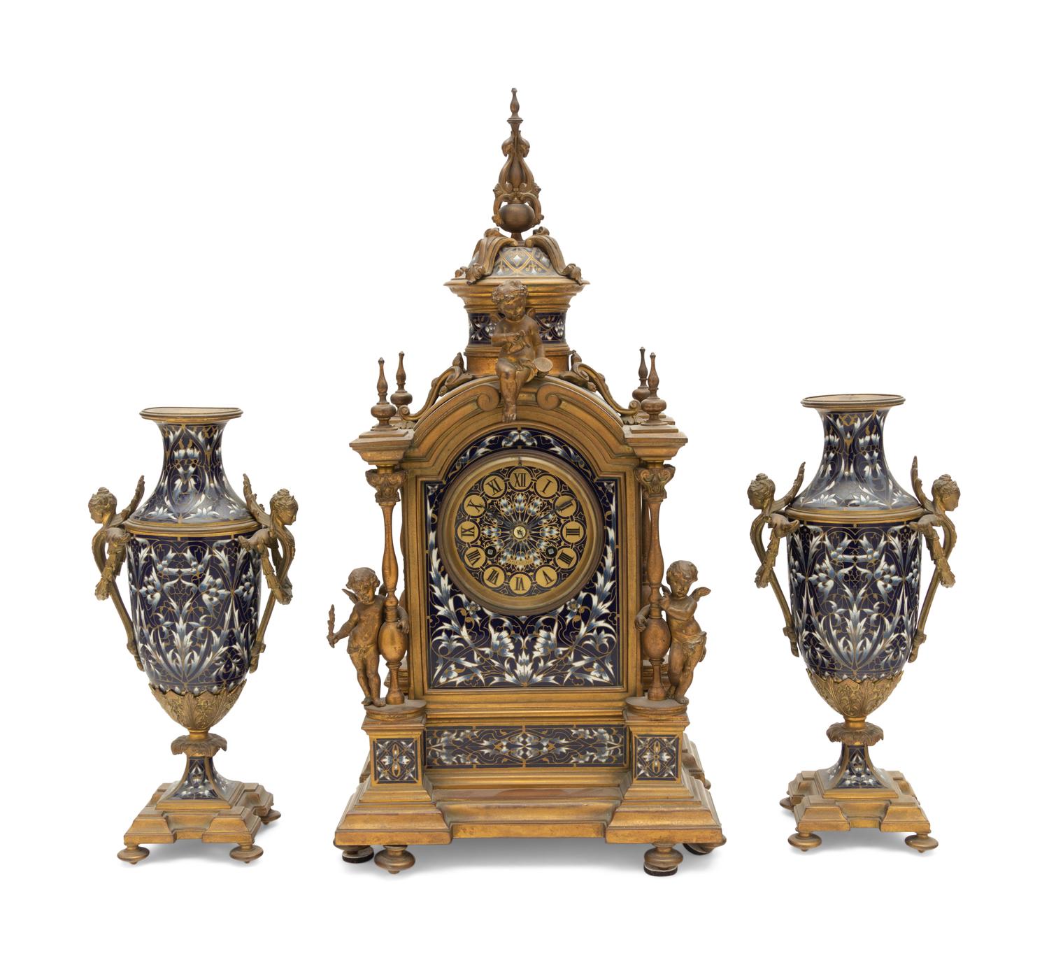 A French Gilt Bronze and Enamel Clock Garniture