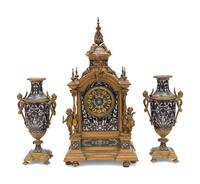 A French Gilt Bronze and Enamel Clock Garniture