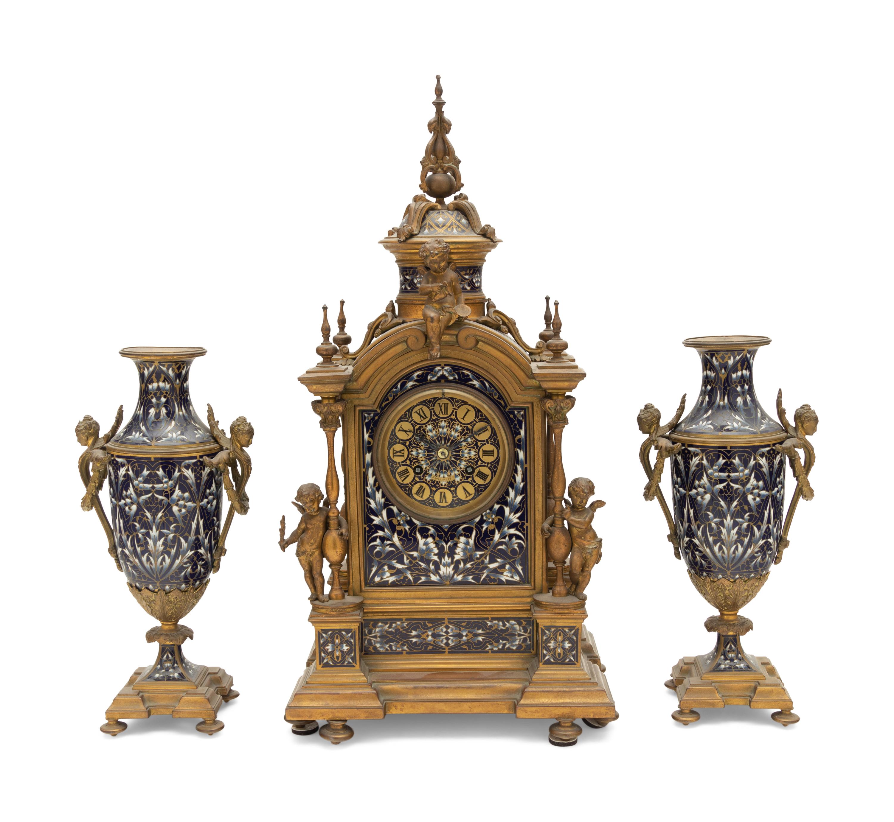 A French Gilt Bronze and Enamel Clock Garniture