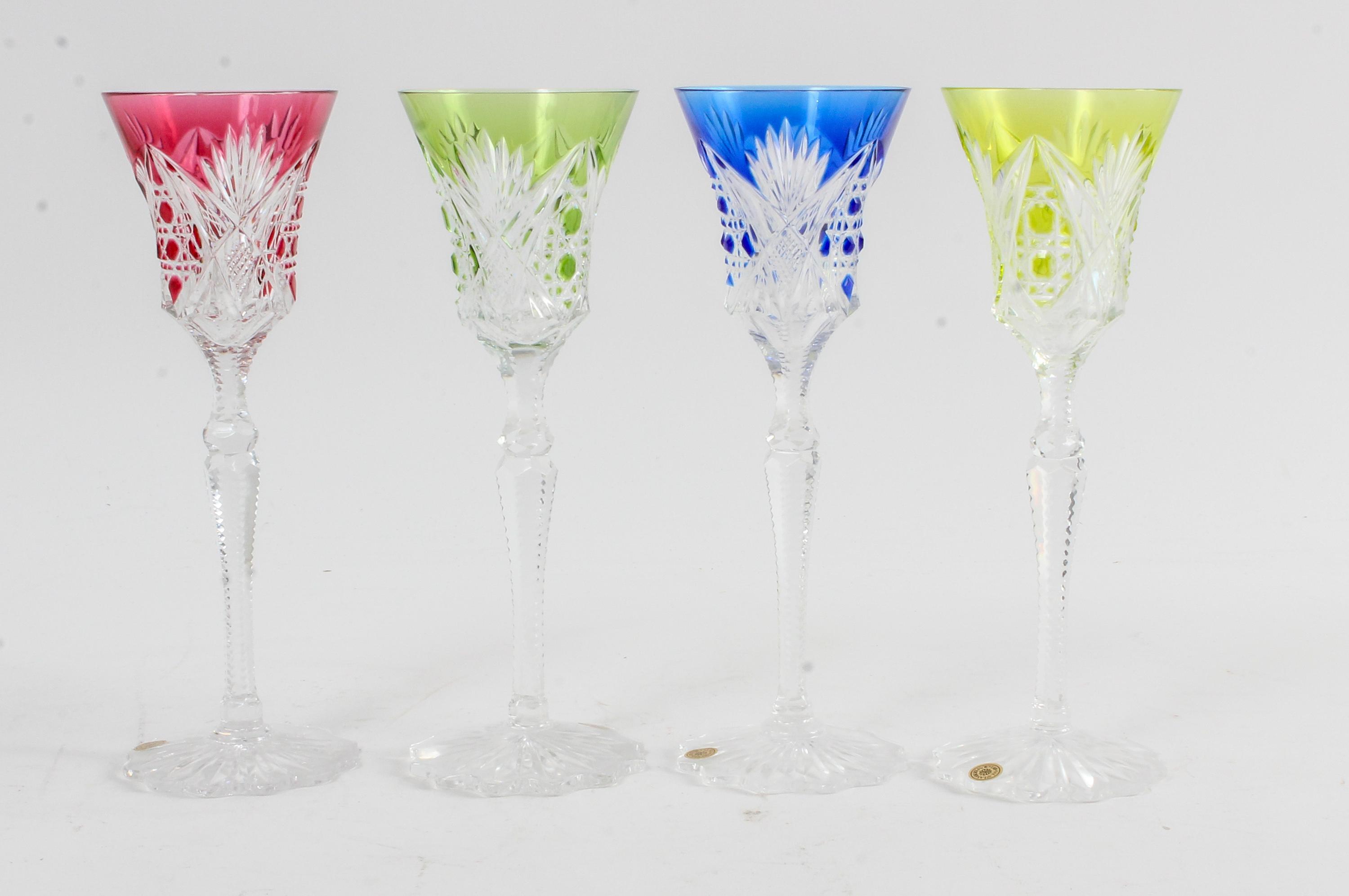 A Set of Four Val St. Lambert Cut Glass Stems Height 9 3/8 inches.
