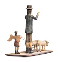 A Carved and Painted New Mexican Bulto of Saint Isidore