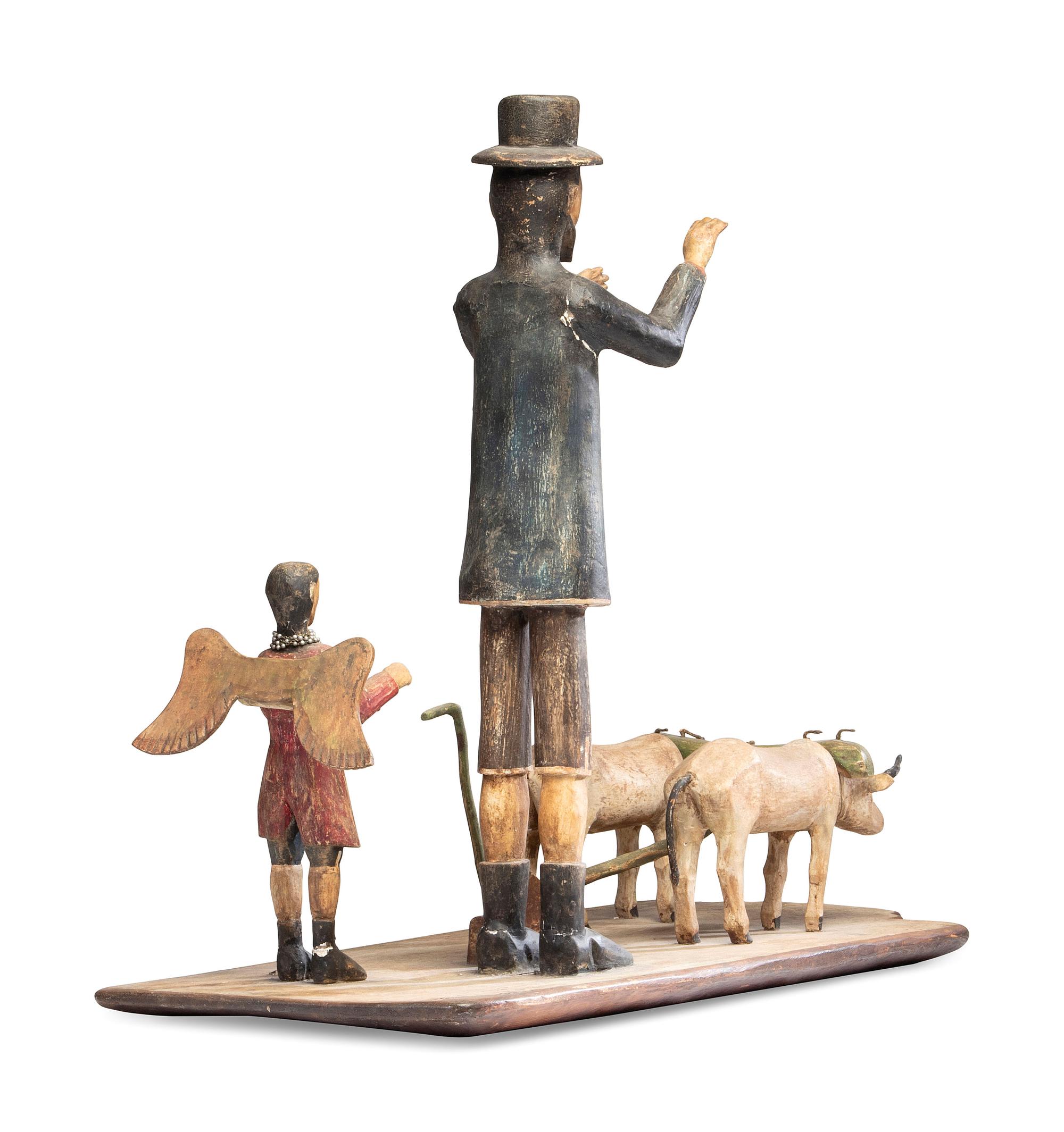 A Carved and Painted New Mexican Bulto of Saint Isidore