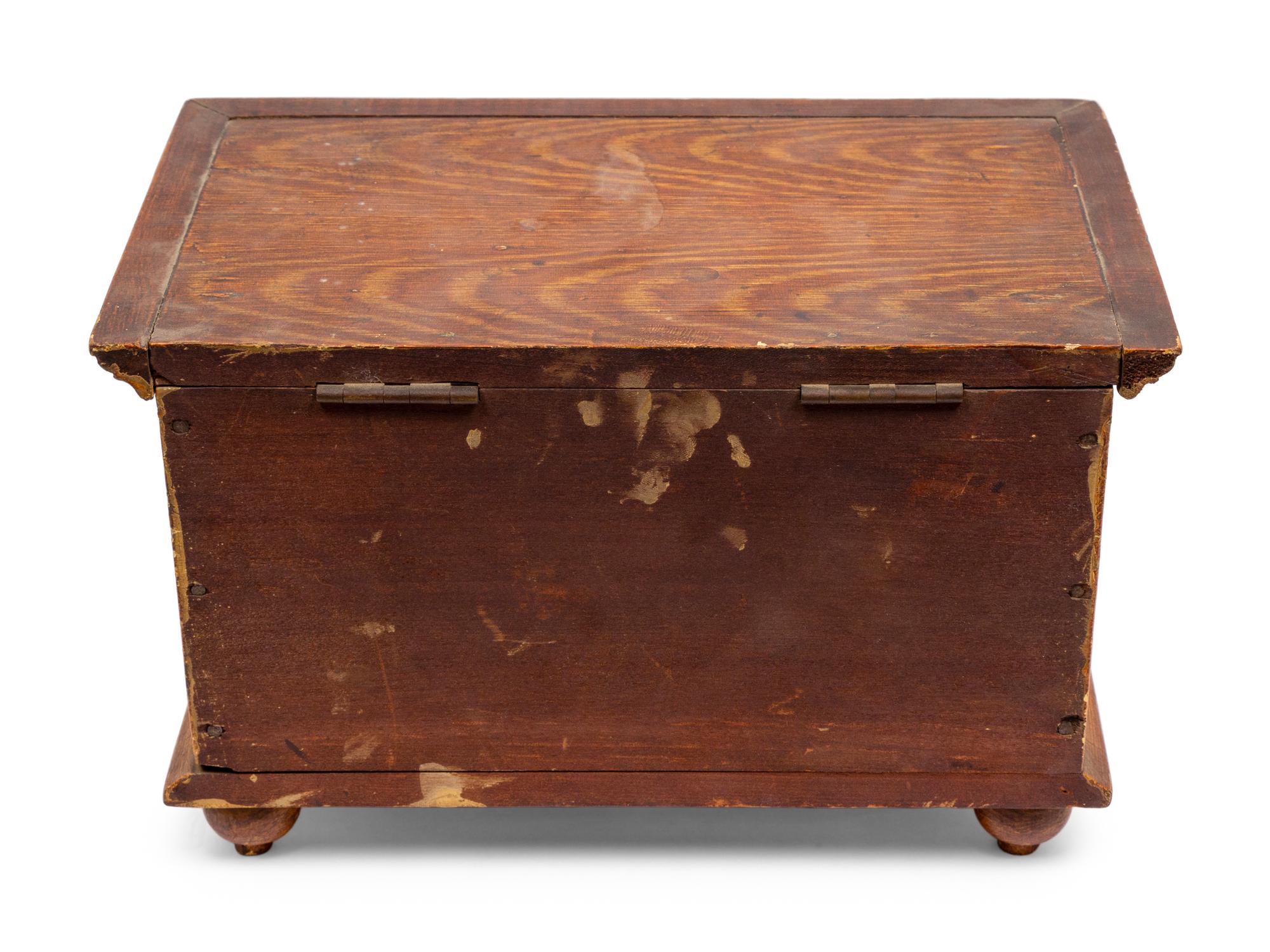 A Miniature Grain Painted Pine Blanket Chest