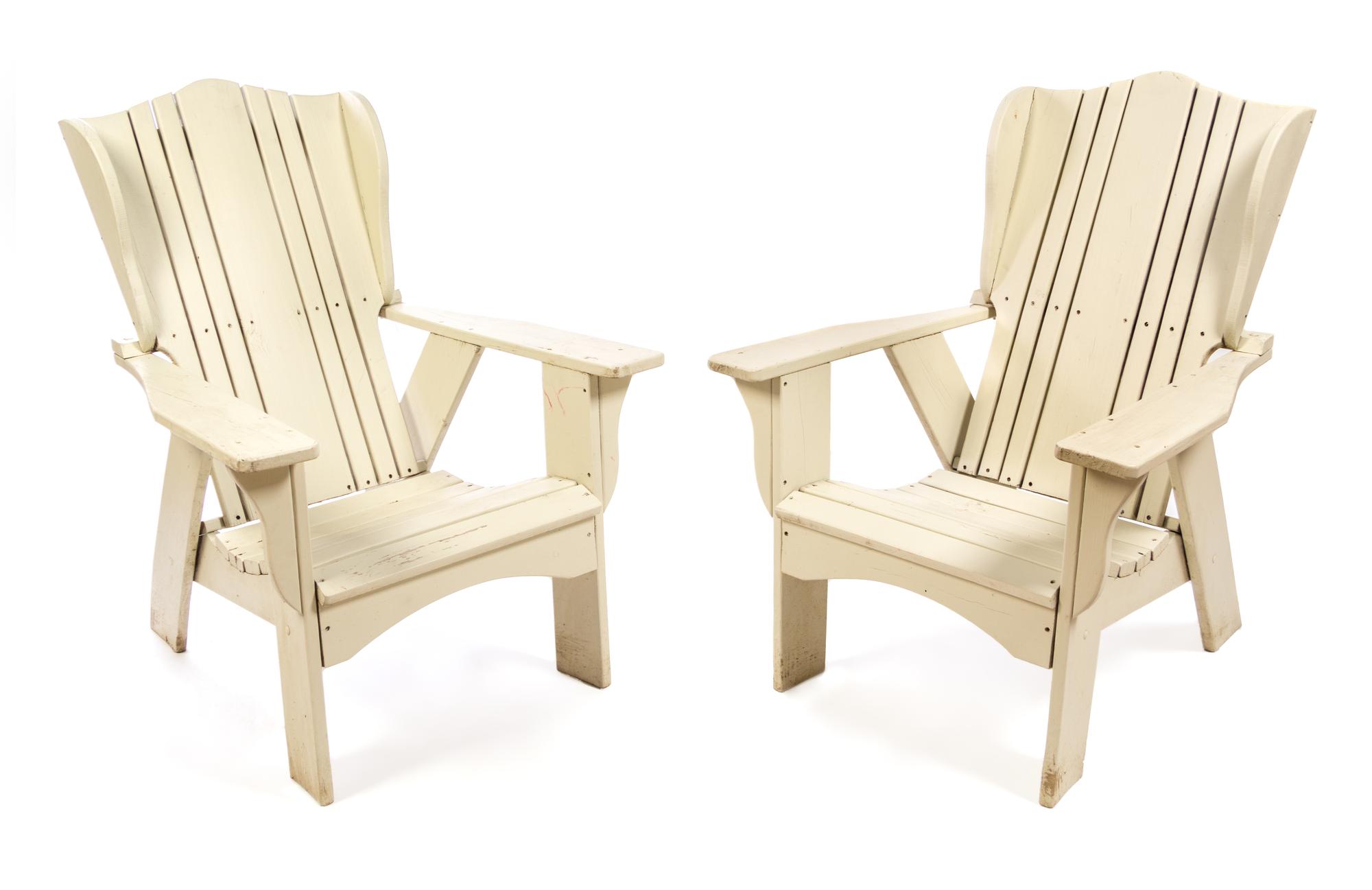 A Set of Four Painted Adirondack Chairs Height 45 inches.