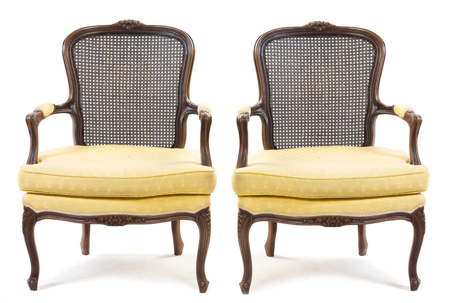 A Pair of Louis XV Style Walnut Fauteuils Height 37 inches.